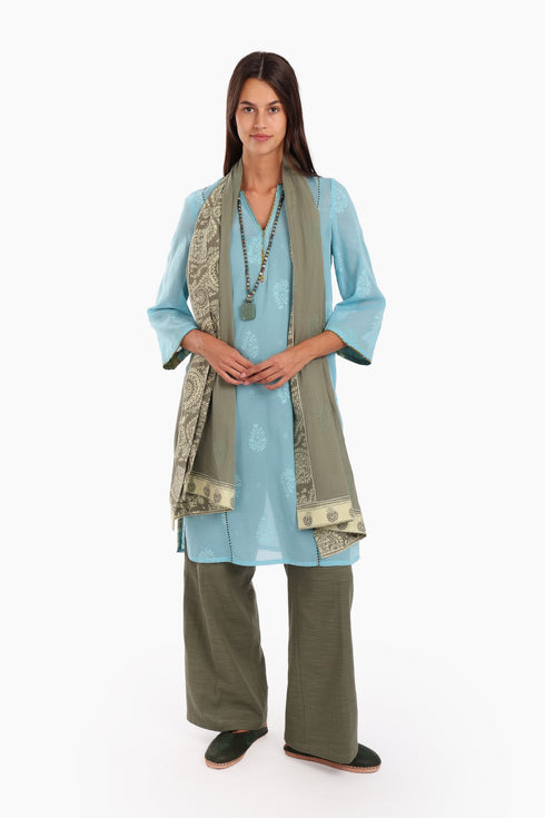 Embroidery tunic with contrast color piping in printed cotton voile